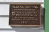 historica plaque in front of schoolhouse
